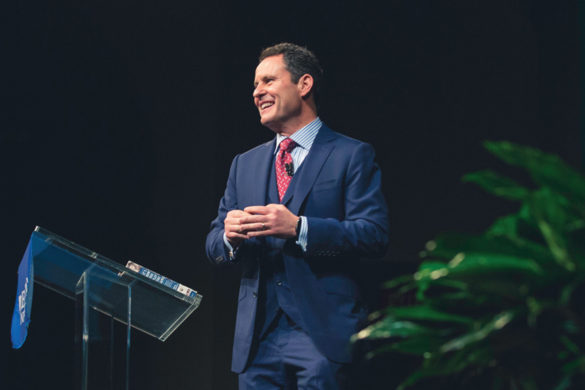 Brian Kilmeade on stage giving a presentation