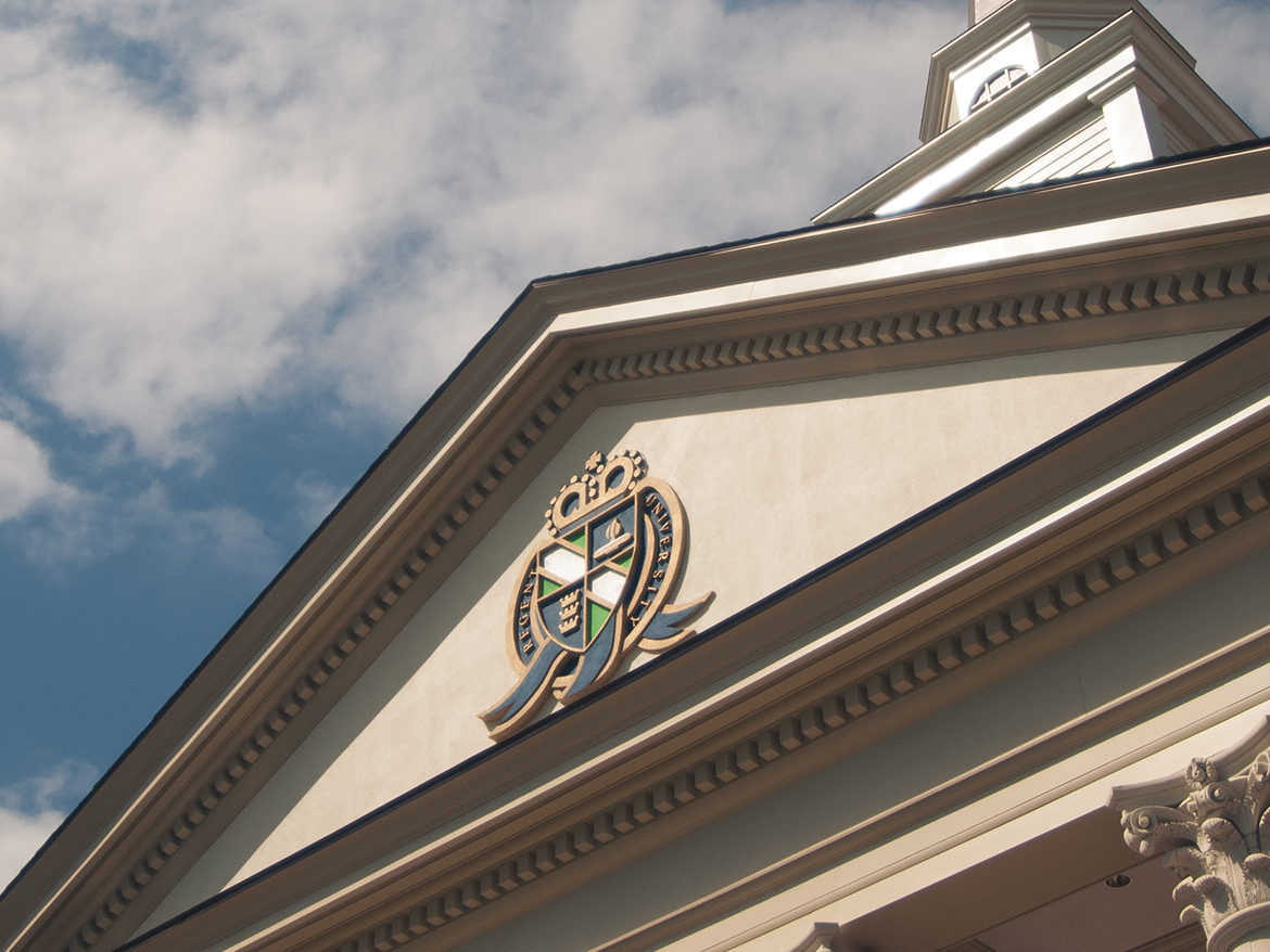 Close up of Regent University seal atop chapel