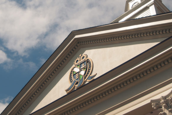 Close up of Regent University seal atop chapel