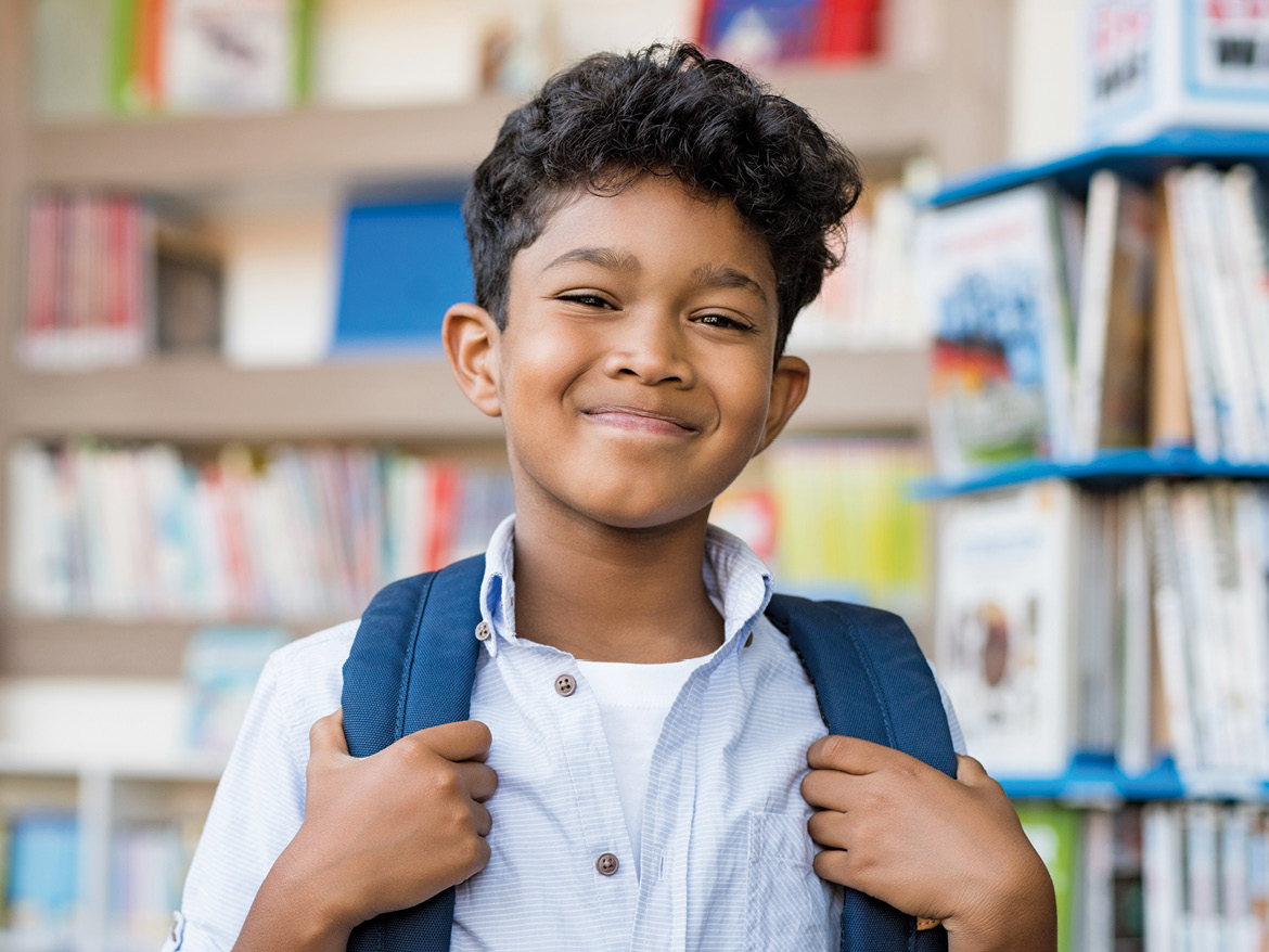 school kid smiling