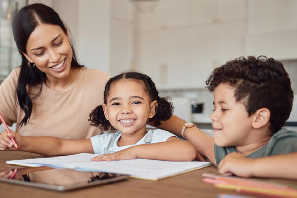 mom and kids doing schoolwork