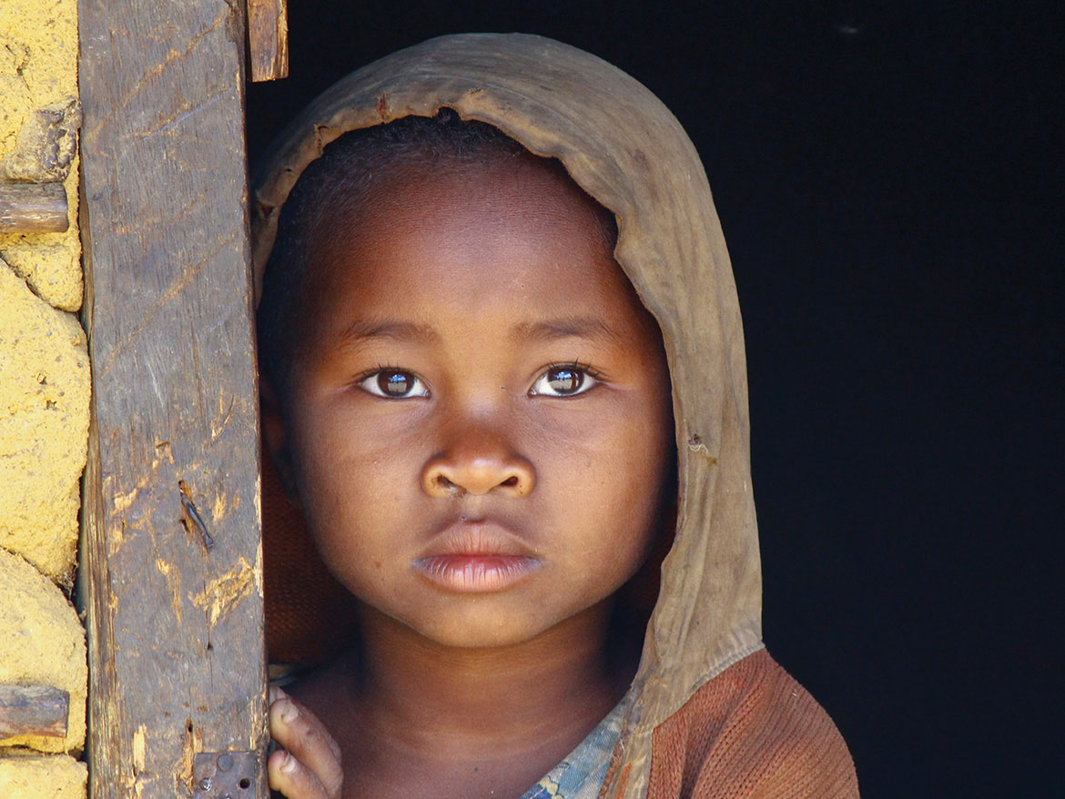 A child standing in the doorway